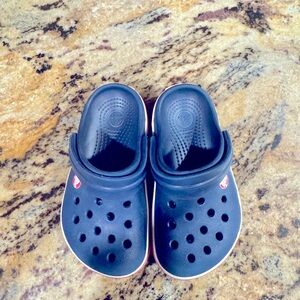 Navy Crocs with white and Red edging